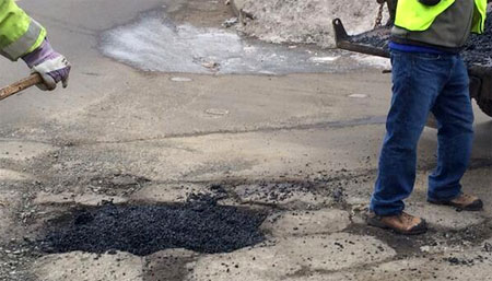 The Ramapo Highway Department out Wednesday filling potholes / @RamapoHighway