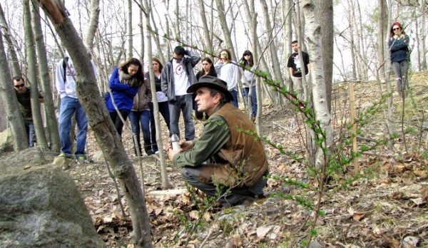 Chuck Stead with students in Torne Valley looking at field samples of Ford paint sludge.