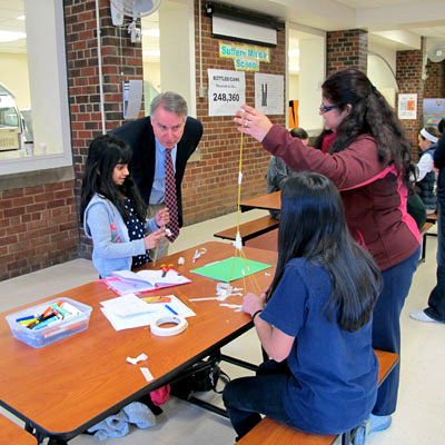 Superintendent of Schools Dr. Douglas S. Adams visited teams as they rushed to complete the design challenge.
