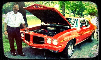 Paul Paulson in his SFD whites and with what looks to be a Pontiac.