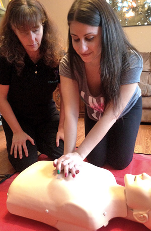 Randi Colton instructs Nicole Russodivito, owner of Rockland Dance & Fitness in Suffern, during a CPR course. / Photo via FitchickFitness.com