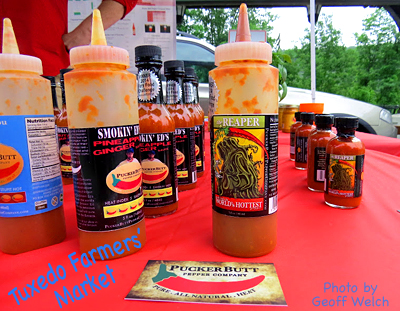 Try a little Puckerbutt pepper sauce, smokin' goodness from Carolina and sold only in these parts at the Tuxedo Farmers' Market.