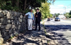 Sloatsburg Mayor Carl Wright discusses deteriorating wall along Rt. 17 with Senator David Carlucci.