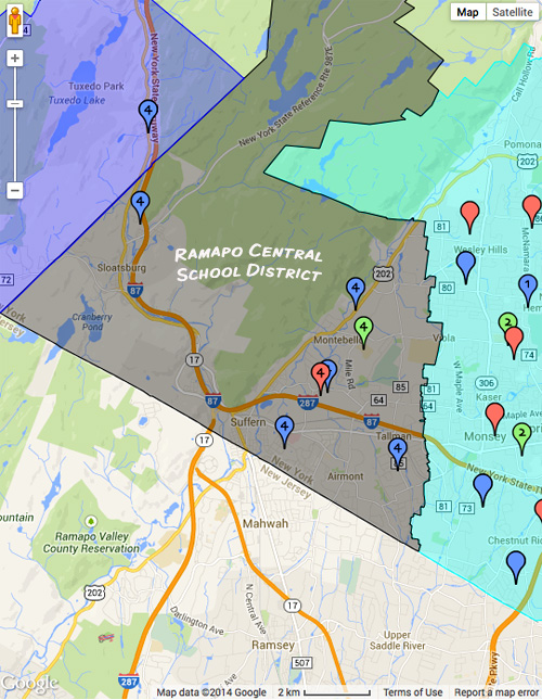 Ramapo Central School District defines the communities of western Ramapo. Blue flags represent public elementary schools, green flag, middel schools and red flags high schools. The light green section east of RCSD is part of East Ramapo School District.