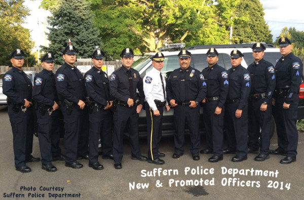 Pictured with their new ranks are PO Ryan Ortiz, PO Billy Simurra, PO Andrew Yorke, PO Mike Careswell, Lt. Ed Dolan, Chief Clarke Osborn, Det. Sgt. John Mallon, Sgt. Jose Martinez, Sgt. Andy Loughlin, Sgt. Jim Giannettino and Sgt. Rick Marsh. 