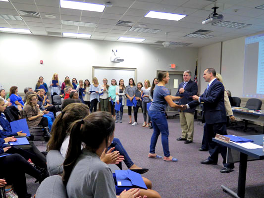 Members of the the Suffern H.S. Girls Lacrosse are congratulated by the members of the Ramapo Central School District. 