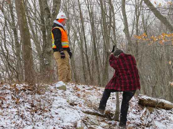 Chuck Stead climbs up a hill in Torne Valley to confer with Arcadis consultant. / Photo by Geoff Welch
