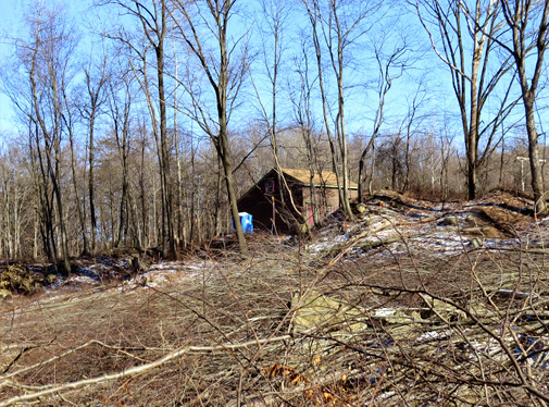 The Ramapo Saltbox sits adjacent to a former sand quarry and dump site for paint sludge from the Ford Motor Co. Mahwah, NJ, plant. / Photo by Geoff Welch