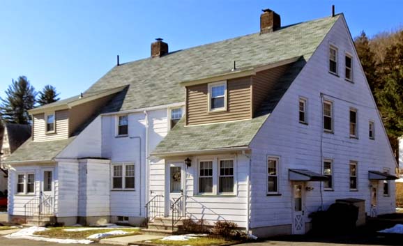 The Stevens and Sweet building, built by Bruce Price in 1900. Price was also the famous father of noted author of American etiquette Emily Post. Post inherited four Bruce Price Cottages in Tuxedo Park from her father.