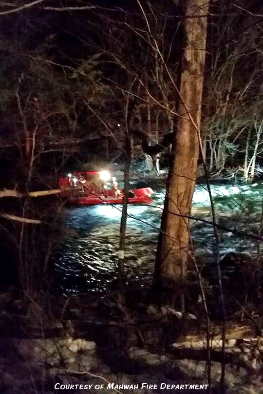 Multiple agencies came to the aid of a suspected robber Sunday night, who plunged into the Ramapo River in Sloatsburg and got stranded on a rock.