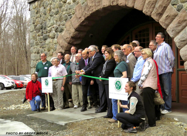 NY/NJ Trail Conference Executive Director Ed Goodell and Mahwah Mayor Bill Laforet cut the ribbon to open the organization's new headquarters at the renovated Darlington Schoolhouse.