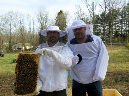 The brother Osters show off their little helpers at the new Osterberry Farms location in Monetebello.