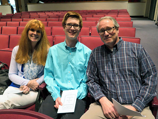 Senior Craig Long, center between his parents Robin and SPD Detective and School Board member Craig Long, won the Suffern Rotary Club Thomas France Memorial Scholarship, awarded for performing arts.