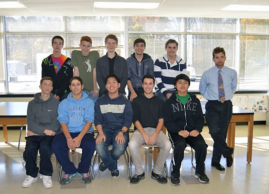 Suffern High School’s Economics Club (pictured with business teacher and advisor Gary Weed) competed in the New York State Economics Challenge for the first time this year. /Photo courtesy of Ramapo Central Schools
