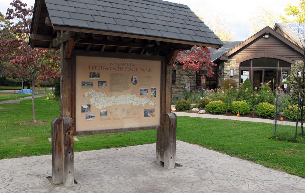 Your basic trailhead kiosk. This one, at Letchworth State Park in central New York State, shows trails, amenities, and pictures of viewpoints. A roof keeps you dry in the rain and a stamped concrete floor keeps your boots from getting muddy. On the opposite side is a description of park wildlife. / Courtesy of MyHarriman.com.