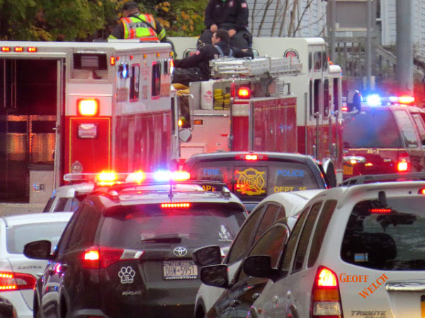 The parade of first responder lights rides slowly through center village Sloatsburg