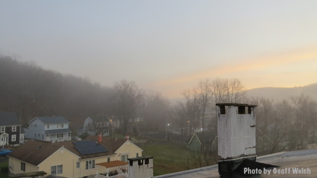 A morning fog tip toes in at sunrise to a just-waking Sloatsburg.