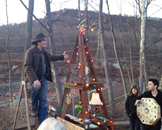 Chuck Stead at the Saltbox solstice tree with Torne Mountain in the background.