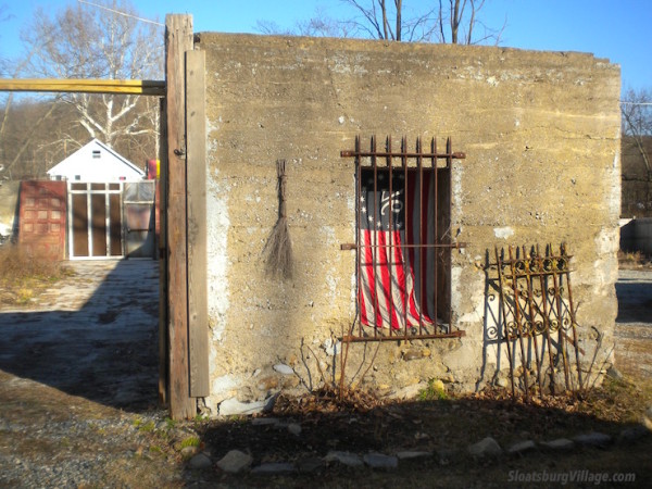 The old walls and entrance from the burned-out barn from the Waldron property, which is scheduled to become a sort of outdoors cafe.