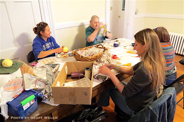 Members of the Friends of Harmony Hall work on decorations and gifts for the Olde Holiday Shoppe which will be part of Sunday's Victorian Holiday.